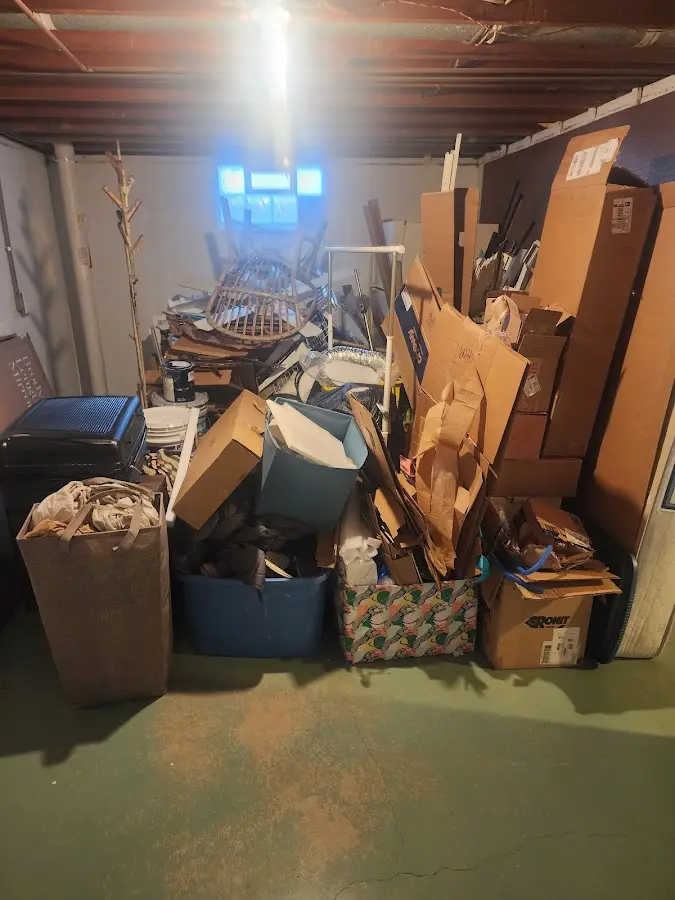 Roll-off dumpster container at job site for 4 Yard Dumpster Rental in Hunter